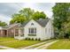 Charming white brick home with a well-maintained yard and beautiful landscaping at 85 Colleton Dr, Charleston, SC 29407
