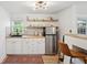 Charming kitchen featuring a butcher block countertop, stainless steel refrigerator, and light wood floors at 85 Colleton Dr, Charleston, SC 29407