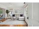 Bright living room with hardwood floors, a comfortable sectional sofa, and plenty of natural light at 85 Colleton Dr, Charleston, SC 29407