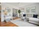 Inviting living room with hardwood floors, a stylish sofa, and decorative accents throughout at 85 Colleton Dr, Charleston, SC 29407