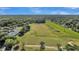 Stunning aerial view of the expansive golf course and beautiful surroundings at 8618 Mcchune Ct, North Charleston, SC 29420
