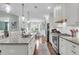 Spacious kitchen featuring stainless steel appliances, granite countertops, and an island with seating at 8618 Mcchune Ct, North Charleston, SC 29420