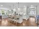 Bright kitchen features stainless steel appliances, granite counters, and an island with bar stool seating at 8618 Mcchune Ct, North Charleston, SC 29420