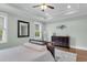 Relaxing bedroom featuring ample closet space, natural light, and an earthy decor at 8618 Mcchune Ct, North Charleston, SC 29420