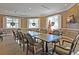 Well-lit meeting room with a long conference table and many chairs, perfect for group gatherings at 8618 Mcchune Ct, North Charleston, SC 29420