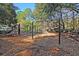 Community playground featuring swings, slides, climbing structures, and soft ground cover for safety at 8618 Mcchune Ct, North Charleston, SC 29420