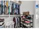 Neatly organized walk-in closet providing ample storage space with shelving and clothing racks at 8618 Mcchune Ct, North Charleston, SC 29420