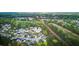 A beautiful aerial view of a residential neighborhood nestled amongst lush green trees at 9447 Harroway Rd, Summerville, SC 29485