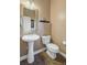 Chic bathroom featuring a pedestal sink, modern fixtures, and neutral-toned walls at 9447 Harroway Rd, Summerville, SC 29485