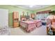 Inviting bedroom with two beds, wooden furnishings, and ample closet space at 9447 Harroway Rd, Summerville, SC 29485