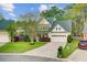 Well-maintained two-story home with a spacious driveway and attached two-car garage at 9447 Harroway Rd, Summerville, SC 29485