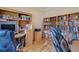 Cozy office space with ample bookshelves and comfortable executive chair at 9447 Harroway Rd, Summerville, SC 29485