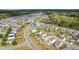Aerial view of the community with pool and neighborhood at 9703 Mosgrove Ave, Ladson, SC 29456