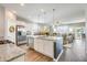 Open-concept kitchen featuring a large island, stainless steel appliances, and modern finishes at 9703 Mosgrove Ave, Ladson, SC 29456