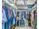 Well-organized walk-in closet with shelving, hanging rods, and ample storage space at 9703 Mosgrove Ave, Ladson, SC 29456