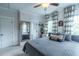 Serene bedroom with a soft color palette and large mirror on the wall at 975 Warrick Oaks Ln, Mount Pleasant, SC 29464