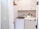 Laundry room equipped with a modern washer and dryer, offering convenience in a compact space at 975 Warrick Oaks Ln, Mount Pleasant, SC 29464