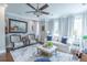 Bright and airy living room showcasing elegant decor, comfortable seating, and large windows at 975 Warrick Oaks Ln, Mount Pleasant, SC 29464