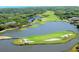 Gorgeous aerial view of a landscaped golf course with water features in a beautiful community at 1 Battery Park Rd, Edisto Island, SC 29438
