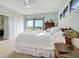 Light and bright bedroom with serene water views and a comfortable bed at 1 Battery Park Rd, Edisto Island, SC 29438