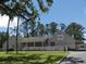 Charming commercial building with well-maintained landscaping and ample parking at 1 Battery Park Rd, Edisto Island, SC 29438