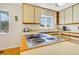 Functional kitchen featuring a smooth cooktop and natural light at 1 Battery Park Rd, Edisto Island, SC 29438