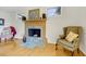 Cozy sitting area with a fireplace and comfortable seating at 1 Battery Park Rd, Edisto Island, SC 29438