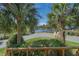 Scenic water view framed by palm trees, offering a tranquil and picturesque setting at 1 Battery Park Rd, Edisto Island, SC 29438