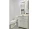 Neat bathroom showcasing a toilet, single sink vanity, mirror, and well-maintained fixtures at 107 Lewisfield Dr, North Charleston, SC 29418