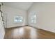 Bright living room with vaulted ceiling, hardwood floors, and ample natural light at 107 Lewisfield Dr, North Charleston, SC 29418