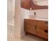 Bathroom with vessel sink, wood vanity, modern fixtures, and sleek finishes offer a contemporary style at 1085 Russellville Rd, Saint Stephen, SC 29479