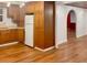 Open kitchen features a refrigerator, wood cabinets, and adjoining dining area at 1085 Russellville Rd, Saint Stephen, SC 29479