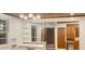 Bright living room with decorative lighting, built-in shelving, and wood accents at 1085 Russellville Rd, Saint Stephen, SC 29479