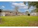 Spacious backyard featuring a lush lawn and privacy fence perfect for outdoor activities at 1109 Lee Shore Ln, Mount Pleasant, SC 29464
