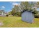 The spacious backyard features a shed and mature trees at 1109 Lee Shore Ln, Mount Pleasant, SC 29464