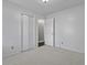 Neutral bedroom with plush carpet, a double closet, and white doors at 1109 Lee Shore Ln, Mount Pleasant, SC 29464