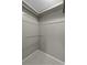 Walk-in closet with neutral walls and metal railing for storage at 1109 Lee Shore Ln, Mount Pleasant, SC 29464