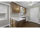 Kitchen features abundant cabinets, counter space and easy access to the rear entry door at 1109 Lee Shore Ln, Mount Pleasant, SC 29464