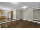 Open-concept living room with hardwood floors and easy access to the adjacent kitchen at 1109 Lee Shore Ln, Mount Pleasant, SC 29464
