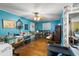 Living Room with unique floral wallpaper, hardwood floors, and vintage furniture at 1144 Island View Dr, Mount Pleasant, SC 29464
