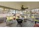 Relaxing screened-in porch with comfortable seating, perfect for enjoying the outdoors at 1144 Island View Dr, Mount Pleasant, SC 29464