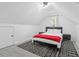 Bedroom with neutral walls, patterned rug, black modern furniture and ample natural light at 1174 Pittsford Cir, Charleston, SC 29412