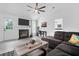 Cozy living room with fireplace, modern decor, and ample natural light, creating a welcoming ambiance at 1174 Pittsford Cir, Charleston, SC 29412