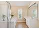 Bright bathroom with a glass-door shower and a separate tub at 119 Oakbluff Rd, Summerville, SC 29485