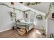 Cozy bedroom features a comfortable bed and sunny window with decorative vines at 119 Oakbluff Rd, Summerville, SC 29485
