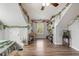 Spacious bedroom with wood floors, natural light, and charming decorative vines at 119 Oakbluff Rd, Summerville, SC 29485