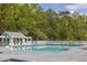Large community pool with ample seating and lounging areas at 119 Oakbluff Rd, Summerville, SC 29485