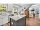Bright kitchen island with lots of natural light and sightlines into the living room at 119 Oakbluff Rd, Summerville, SC 29485