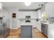 Modern kitchen featuring white cabinets, stainless steel appliances, and center island at 119 Oakbluff Rd, Summerville, SC 29485