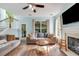 Comfortable living room with a ceiling fan, fireplace, and inviting seating area at 119 Oakbluff Rd, Summerville, SC 29485